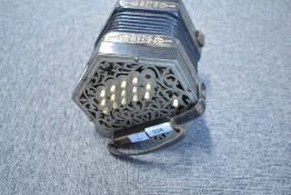 A Jeffries 32 button Anglo concertina , one button missing and needs a tidy up but bellows seem