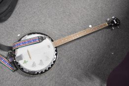 A traditional five string banjo , headstock marked L (Lorenzo)