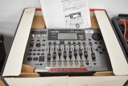 A Boss BR-900CD digital recording studio, with original box and instructions