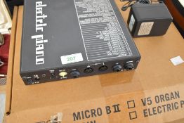 A Voce electric piano sound module (never used) , in original fitted box with power supply and
