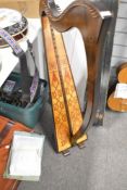 A traditional celtic style harp , height approx. 110cm, with cover , spare strings and music