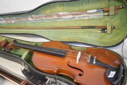 A traditional violin having one piece 14' back , in vintage fitted case, sold with two bows