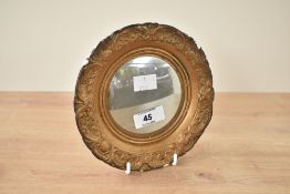 A small Shellcraft oval mirror decorated in the Rococo style, H16cm Condition report: Damage to rim