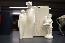 Two Royal Doulton bone china figures/figure groups comprising 'Christmas Dreams' HN 4447 and '