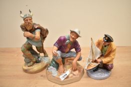 A group of three Royal Doulton bone china figures comprising 'Sailor's Holiday' HN 2442, 'Viking' HN