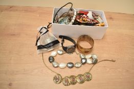 A large collection of costume jewellery, including statement pieces, beaded jewellery and shell