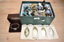 A collection costume jewellery, including a 9ct gold cross pendant (0.5g), statement pieces,