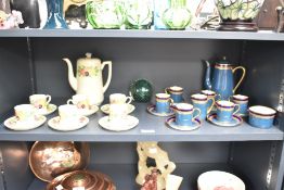 A Ridgway tea service hand painted with floral patterns on a crackle glaze ground, comprising of tea