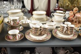 A Wedgwood 'Clio' pattern Bone China dinner service, having gilt edges and floral patterns, to