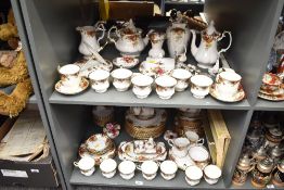 A Royal Albert 'Old Country Rose' pattern dinnder service, having gilt edges and floral designs,