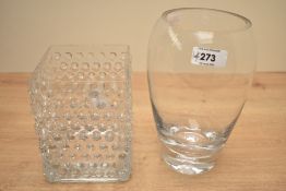 A clear glass ovoid vase having encased bubble base, h20.5cm, sold together with a square textured