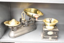 An early 20th century metal coffee grinder having drawer and wooden handle, h16cm, sold together