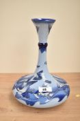 A Moorcroft pottery 'Florian Yacht' vase having knopped neck, impressed marks and signed by John