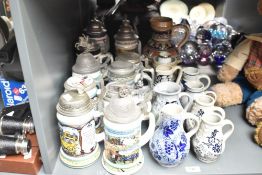 A quantity of Bierseidel lidded beer stein's, decorated in a variety of scenes including street