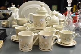 A Royal Doulton Lambethware 'Florinda' pattern tea service, to include tea pot, cups and saucers