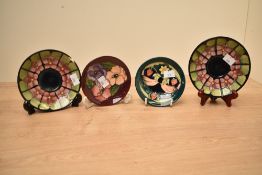 Two Moorcroft Pottery pin dishes, of dished circular form, tube-lined in the Strawberry Thief and