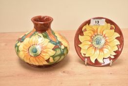 A Moocroft pottery 'Inca' sunflower pattern vase of lobbed form, designed by Rachael Bishop, painted