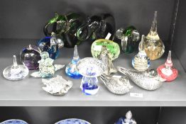 A collection of glass paperweights, to include elephants, birds and apples, (17)