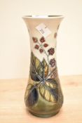 A (William) Moorcroft pottery 'Bramble' pattern vase, painted and impressed marks to base, h20.5cm