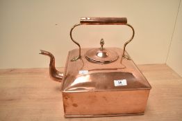 A 19th century copper tea pot of square form, having shaped spout and handle, w31.5cm