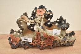 A carved Chinese soapstone carving of blossoms, bat and bird, h13cm