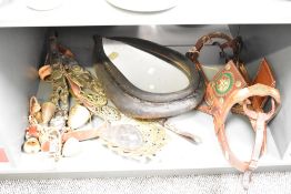 A leather horse harness having cross symbol and brass buckle, sold together with horse brass ,