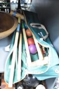 A ApudArmis Croquet set with original green canvas bad, comprising of 6 mallets, 6 coloured balls, 8