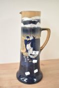 A Royal Doulton service ware 'Monks in the Cellar' pattern pitcher of spreading cylindrical form