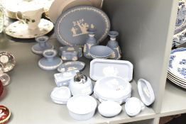 A quantity of Wedgwood Jasper ware, to include a pair of candlesticks, a pair of vases, a pair of