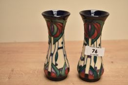 A pair of Moorcroft 'Macintosh Rose' pattern vases having tube lined decoration of red and green