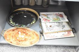A 20th century oval serving tray decorated with marquetry floral patterns and pierced trim, L40cm,