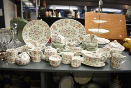 A Haddon Hall 'Minton' pattern dinner service, decorated with floral designs on a white ground,