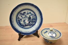 An early 20th century blue and white Chinese plate decorated with landscape scenes, w22.5cm, sold