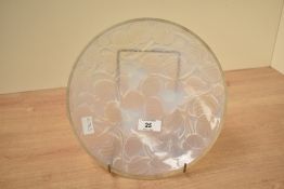 A 20th century Arvers opalescent glass charger decorated with foliage patterns, impressed mark to