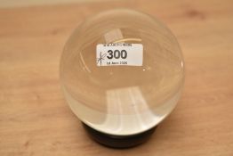 A transparent crystal ball on stand, h9cm