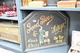A hand painted 'Good Beer and Good Cheer' wooden pub sign, L60cm