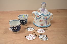 A early 20th century ceramic tea pot in the form of a little old lady, h15.5cm, sold together with a