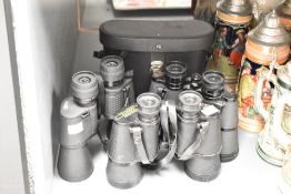 Three pairs of binoculars, comprising Europa, Optus and Greenkat in case