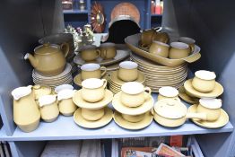 A Denby green ceramic dinner service, decorated with geometrical patterns, to include tea pot,