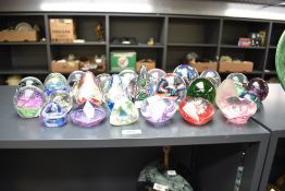 A collection of thirty two miscellaneous glass paperweights, various including Caithness