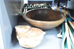 A rustic wooden bowl of irregular form, w27cm, sold together with another wooden bowl, (2)