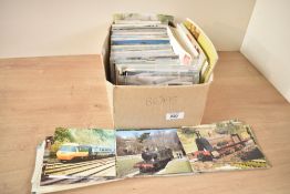 A quantity of Railwayana postcards and used stamps, to include London and South Western Railway,