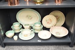 A Susie Cooper 'Burslem' dinner service, decorated with floral patterns, to include ashet, cream jug