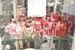 A Bohemian style decanter with stopper, decorated with red floral patterns, h16cm, sold together