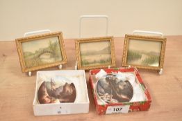 Two 19th century miniature ceramic oval plaques, hand coloured depicting landscape scenes, H7cm,