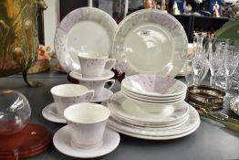 A Portmeirion 'Dawn' pattern part dinner service, decorated with floral designs on a white ground,