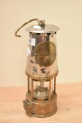 A early 20th century Eccles miners lamp, having rivet joints and impressed mark type '6RS', h23cm