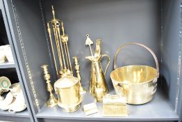 A 19th / early 20th century brass jam pan, w31cm, sold together with a ewer, pair of candlesticks