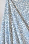 A pair of mid-century Morris & Co curtains, in the powder blue Oak Trees pattern. The curtains
