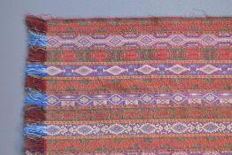 A vintage woven blanket or 'Lliklla' hand-woven shoulder cloth, in the rainbow-coloured style